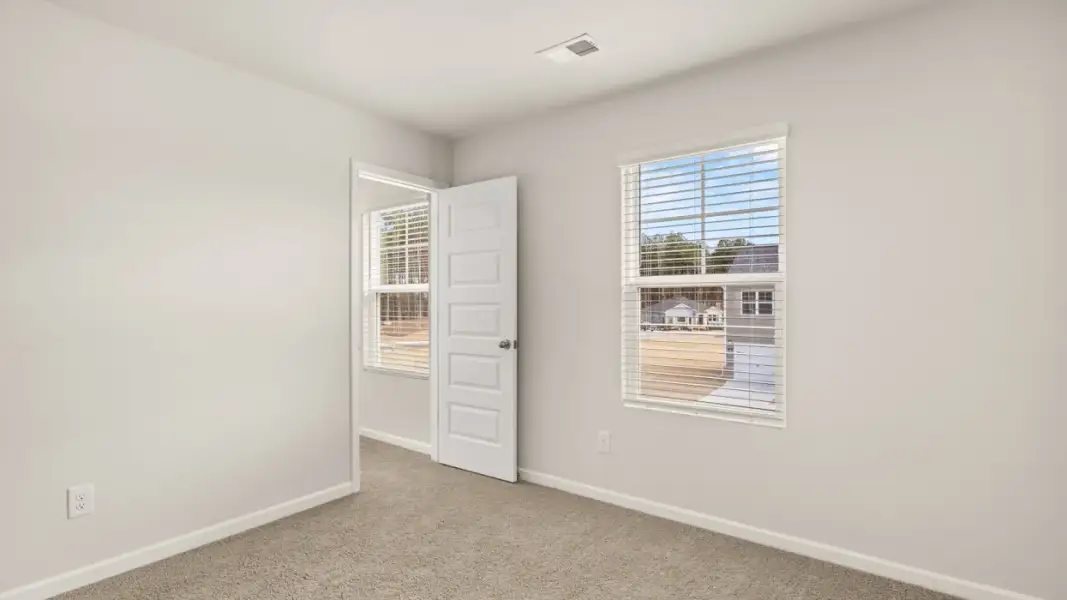 Representative unfurnished interior of a home built from the Ansley by D.R. Horton in Stillwater Lake Oconee, Eatonton (Image 29).