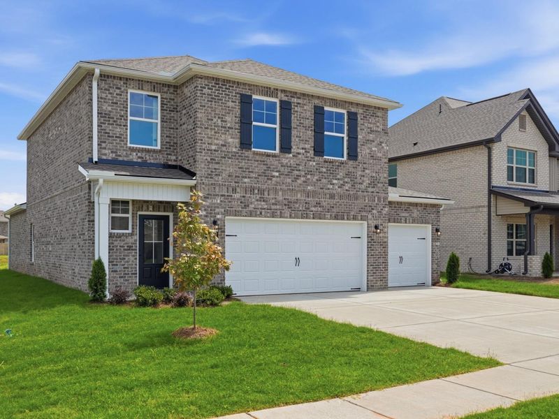 Representative exterior photo of a completed home built from the The Meadowbrook A by Davidson Homes LLC in Bailey Park, Fayetteville, TN (Image 27). Representative exterior photo of a completed home built from the The Meadowbrook A by Davidson Homes LLC in Bailey Park, Fayetteville, TN (Image 27).