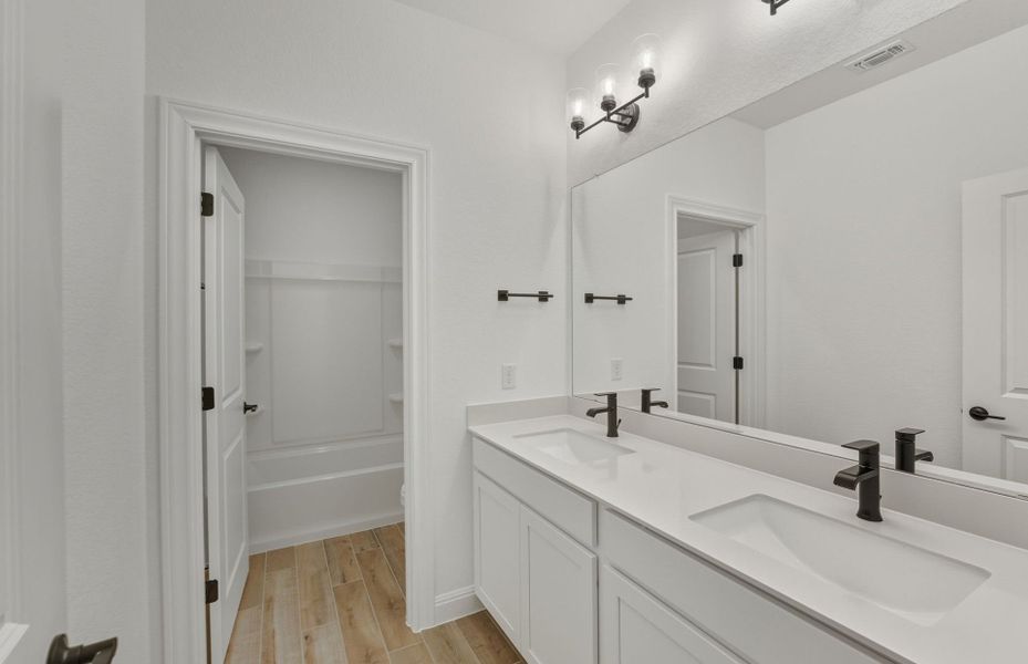 Furnished interior view inside a new home in Saddleback at Santa Rita Ranch, Liberty Hill (Image 14). Furnished interior view inside a new home in Saddleback at Santa Rita Ranch, Liberty Hill (Image 14).