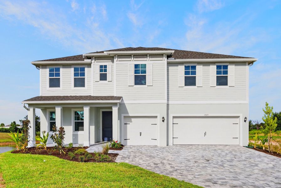 Representative exterior photo of a completed home built from the Jupiter by William Ryan Homes in Tamarack at Two Rivers, Zephyrhills, FL (Image 22).