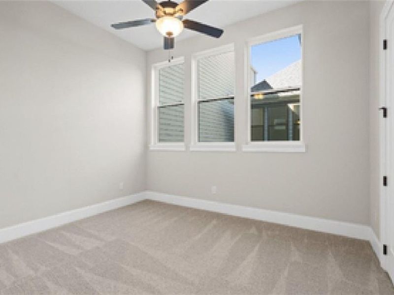 Spacious, unfurnished interior of a new home in The Village at Towne Lake, Woodstock (Image 37).