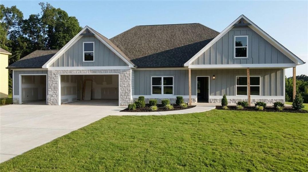 Front exterior of a new home in , Dallas, GA, highlighting curb appeal (Image 1). Front exterior of a new home in , Dallas, GA, highlighting curb appeal (Image 1).