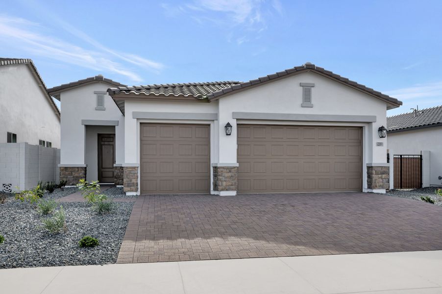 Front exterior of a new home in Tavolo at Soleo, San Tan Valley, AZ, highlighting curb appeal (Image 1). Front exterior of a new home in Tavolo at Soleo, San Tan Valley, AZ, highlighting curb appeal (Image 1).