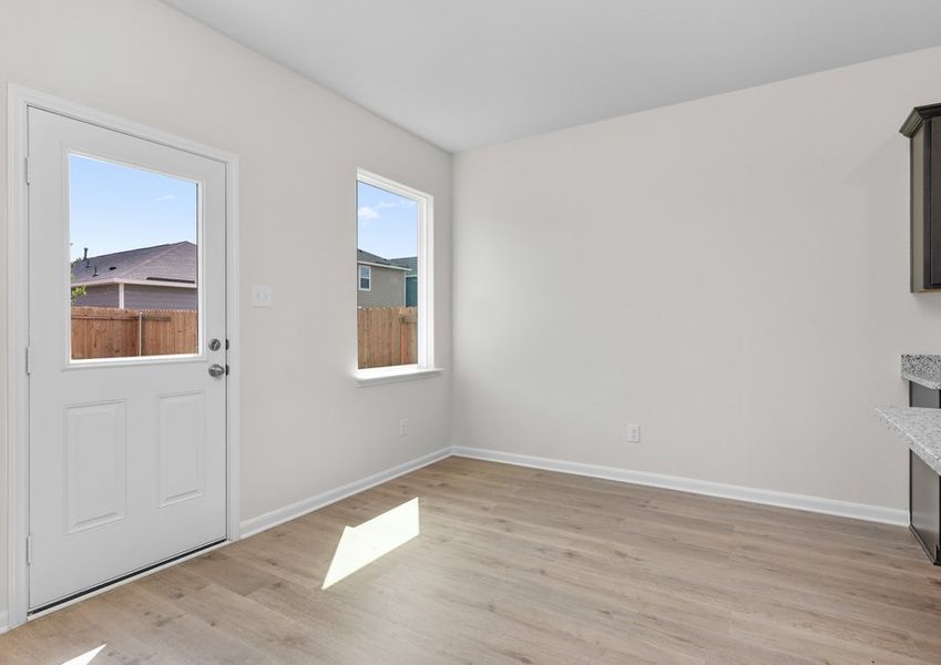 The dining room has a large window that lets in great, natural light and backyard views. The dining room has a large window that lets in great, natural light and backyard views.