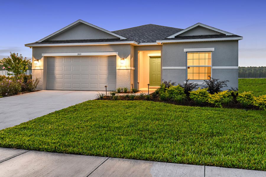 Representative exterior photo of a completed home built from the Goldfinch by Taylor Morrison in Solena, North Fort Myers, FL (Image 11).