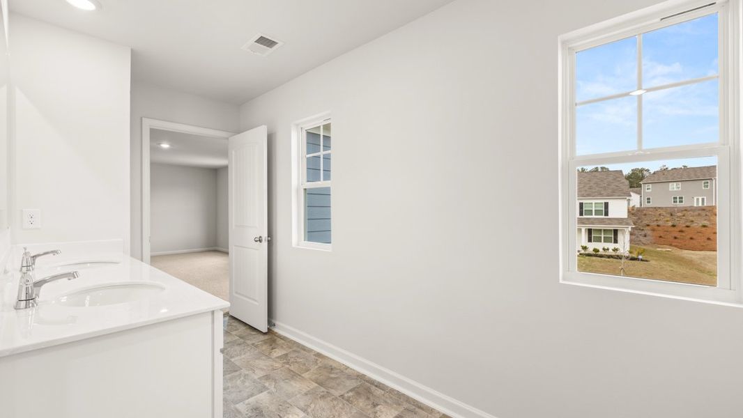 Representative furnished interior of a home built from the Galen by D.R. Horton in Thompson Ridge, Dallas (Image 8).