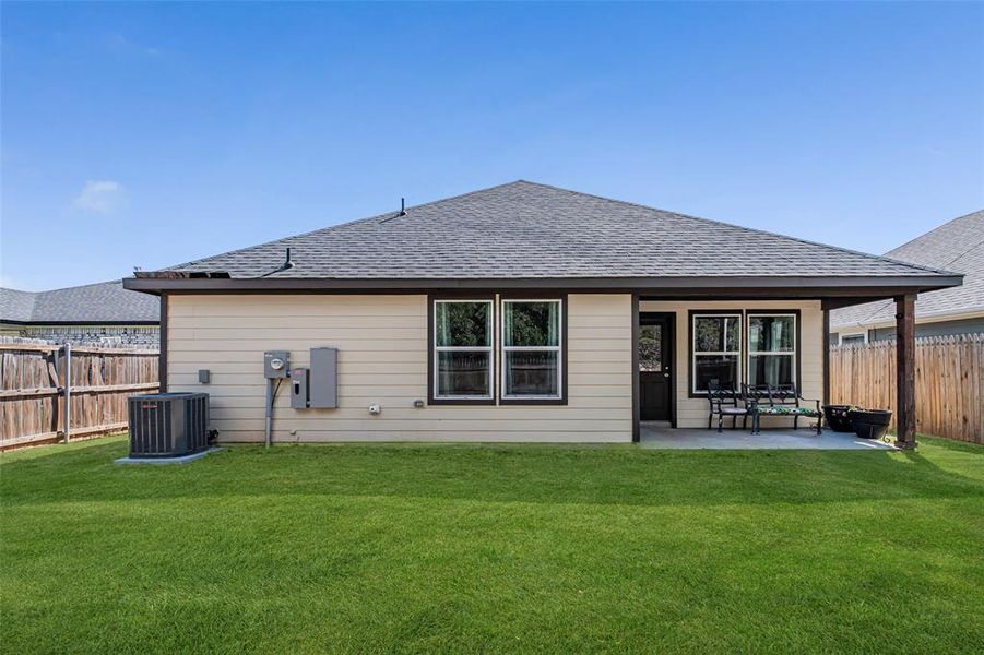 Exterior details and patio area of a home in , Granbury (Image 28).
