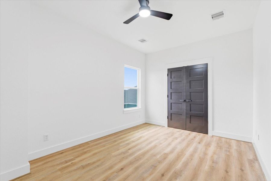 Another spacious bedroom with a walk in closet on the second floor!