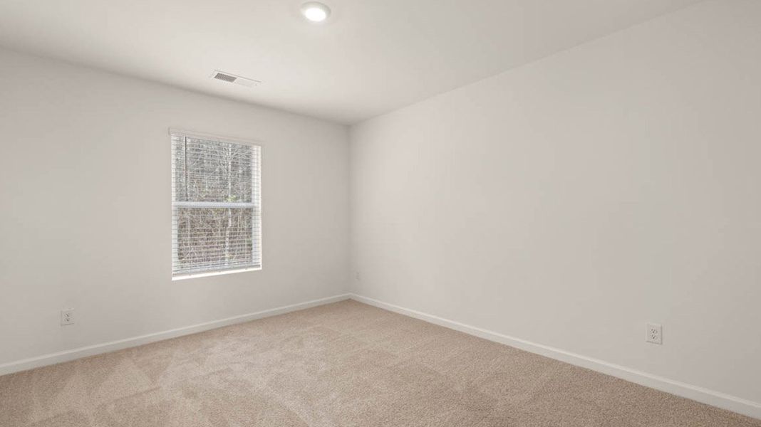 Representative unfurnished interior of a home built from the Packard by D.R. Horton in Evergreen Crossing, Locust Grove (Image 29).