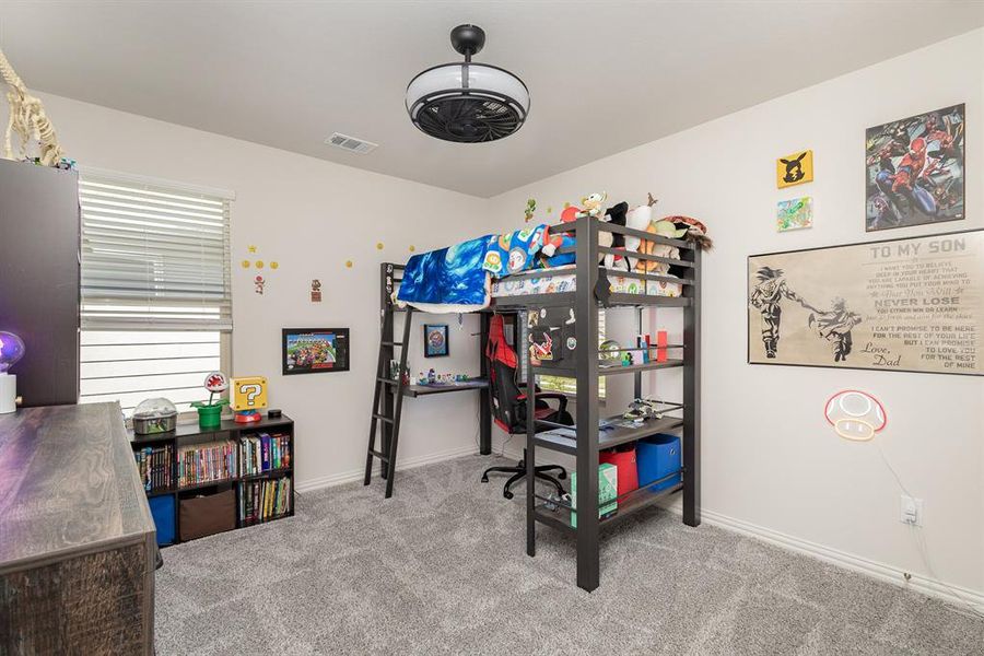 Bedroom featuring carpet flooring