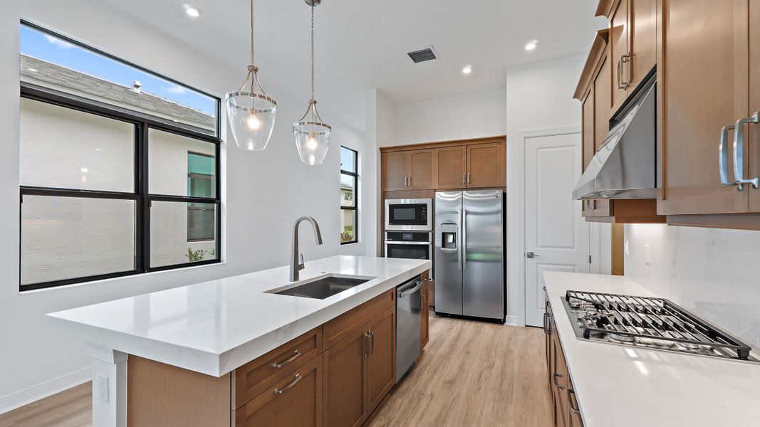 Furnished interior view inside a new home in Rivella, Port St. Lucie (Image 8).