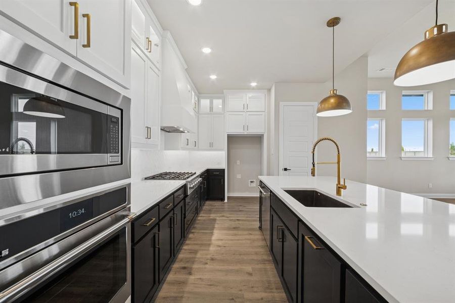 Furnished interior view inside a new home in Pecan Square - Estates, Northlake (Image 14). Furnished interior view inside a new home in Pecan Square - Estates, Northlake (Image 14).