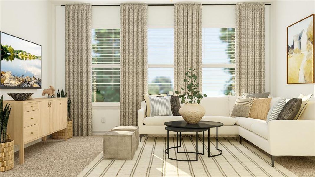 Sitting room featuring light carpet