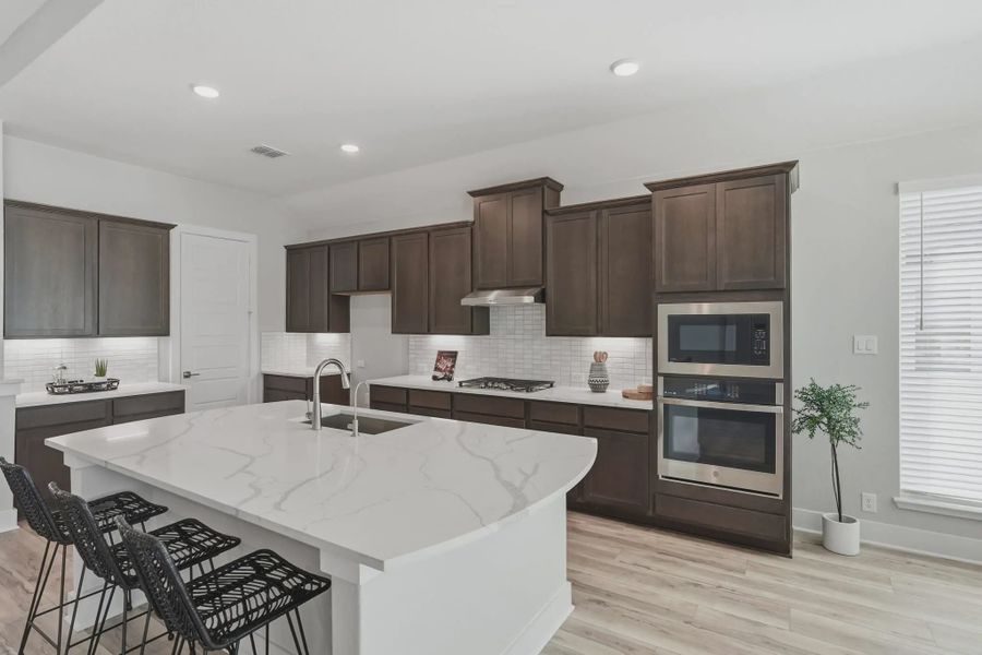 Representative furnished interior of a home built from the Brody by Chesmar Homes in Esperanza 60's, Boerne (Image 5).