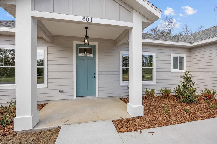 Front exterior of a new home in , Bronson, FL, highlighting curb appeal (Image 20).