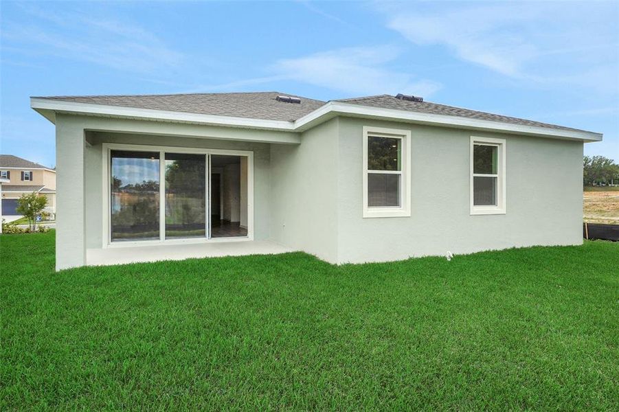 Exterior details and patio area of a home in Tuscan Hills, Dade City (Image 25).