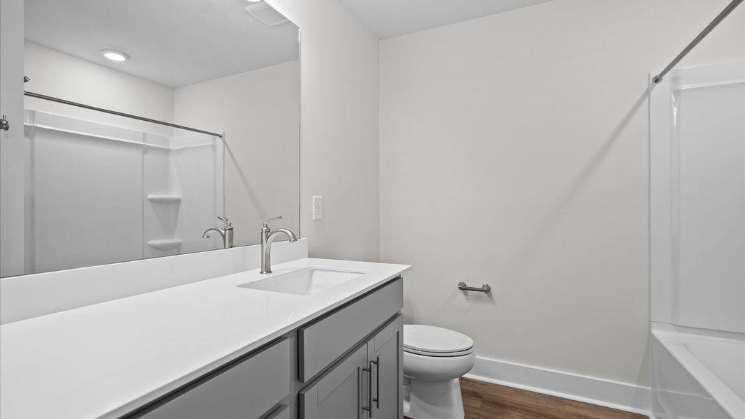 Elegant bath retreat with designer finishes and a clean, timeless aesthetic at Silo Ridge by DRB Homes in Anderson, SC