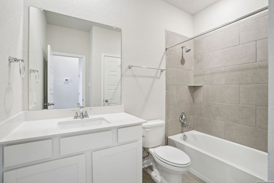 Furnished interior view inside a new home in Royal Crest, San Antonio (Image 8).