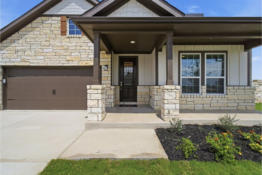 Exterior details and patio area of a home in Santa Rita Ranch, Liberty Hill (Image 3).