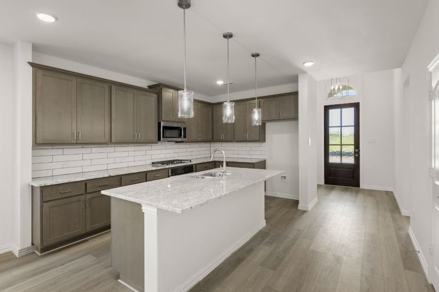 Representative furnished interior of a home built from the Cypress by UnionMain Homes in Edgewater, Fate (Image 7).
