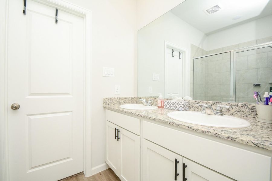 Furnished interior view inside a new home in Granger Pines, Conroe (Image 20).