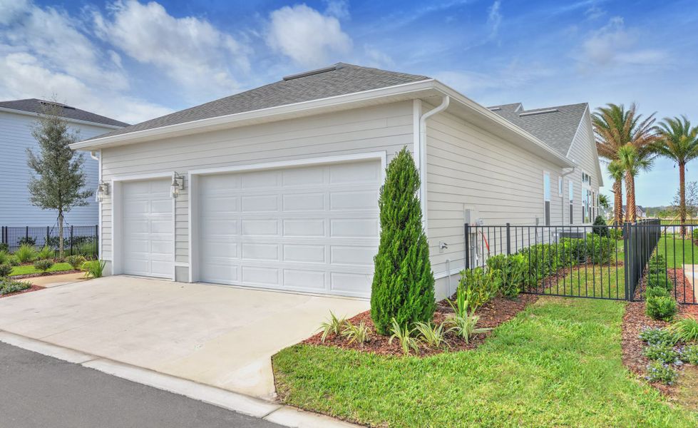 Front exterior of a new home in Seven Pines, Jacksonville, FL, highlighting curb appeal (Image 18).