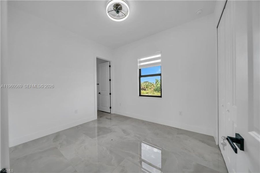 Spacious, unfurnished interior of a new home in , Lehigh Acres (Image 13).