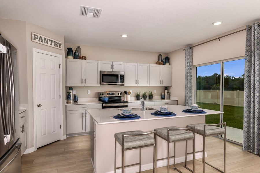Representative furnished interior of a home built from the Indigo by Casa Fresca Homes in Villa Mar, Winter Haven (Image 7). Representative furnished interior of a home built from the Indigo by Casa Fresca Homes in Villa Mar, Winter Haven (Image 7).