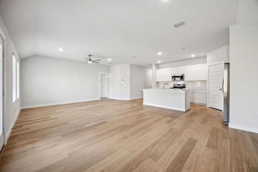 Open Floor Plan in the Emmy II home plan by Trophy Signature Homes - REPRESENTATIVE PHOTO