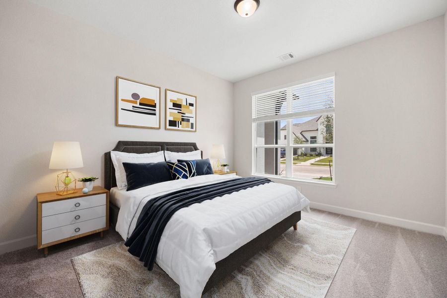 Desirable first-floor secondary bedroom positioned perfectly at the front of the home for optimal privacy. This versatile space features a large front-facing window that floods the room with natural light, plush neutral carpeting, and generous wall space for flexible furniture arrangements. Complete with a private ensuite bathroom, this room serves as the ultimate guest suite or multi-generational living space. *Virtually Staged Desirable first-floor secondary bedroom positioned perfectly at the front of the home for optimal privacy. This versatile space features a large front-facing window that floods the room with natural light, plush neutral carpeting, and generous wall space for flexible furniture arrangements. Complete with a private ensuite bathroom, this room serves as the ultimate guest suite or multi-generational living space. *Virtually Staged