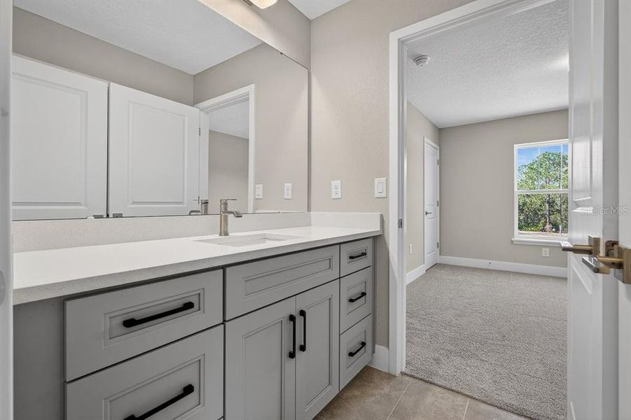 Furnished interior view inside a new home in Gray Hawk at Hole Two, Daytona Beach (Image 12).