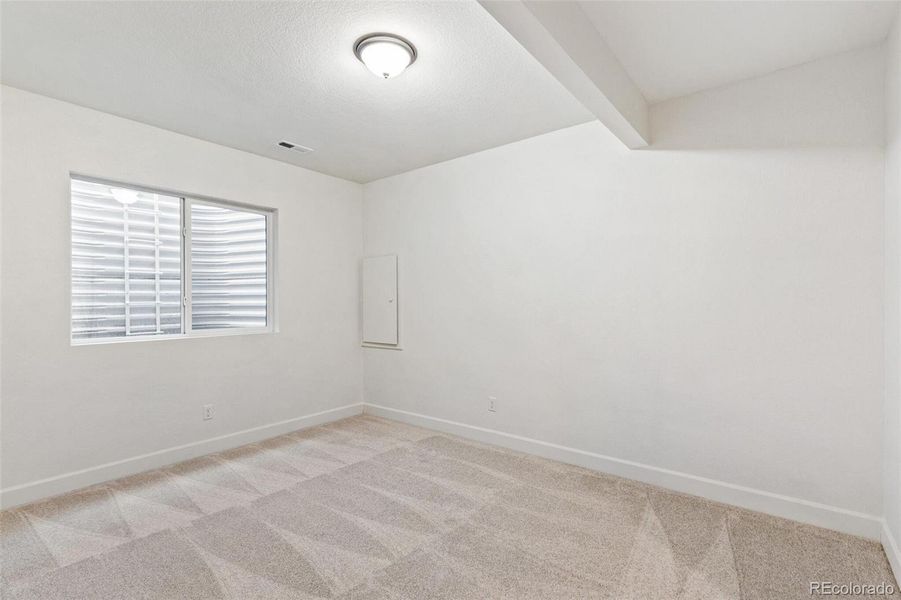 Spacious, unfurnished interior of a new home in Sky Ranch Villas, Watkins (Image 32).