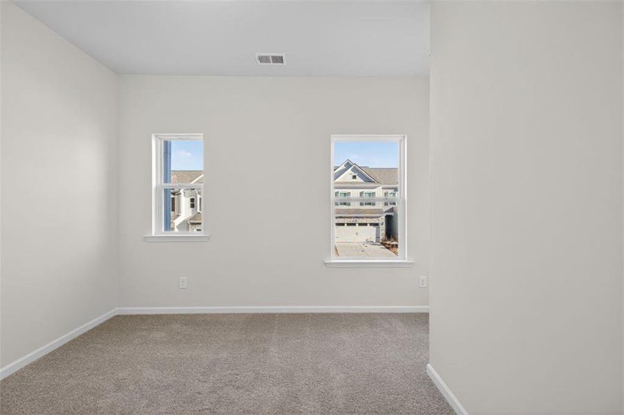 Spacious, unfurnished interior of a new home in Trinity Station, Auburn (Image 26).