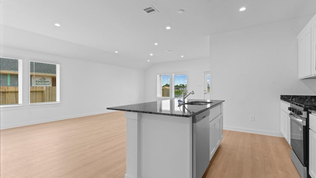 Representative furnished interior of a home built from the Caden by D.R. Horton in Caldwell Crossing, Iowa Colony (Image 8).