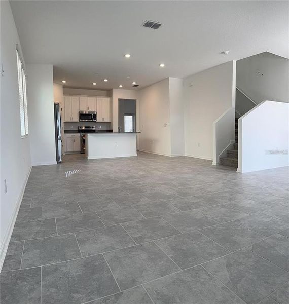 Spacious, unfurnished interior of a new home in Wellness Ridge: Cottage Collection, Clermont (Image 16). Spacious, unfurnished interior of a new home in Wellness Ridge: Cottage Collection, Clermont (Image 16).