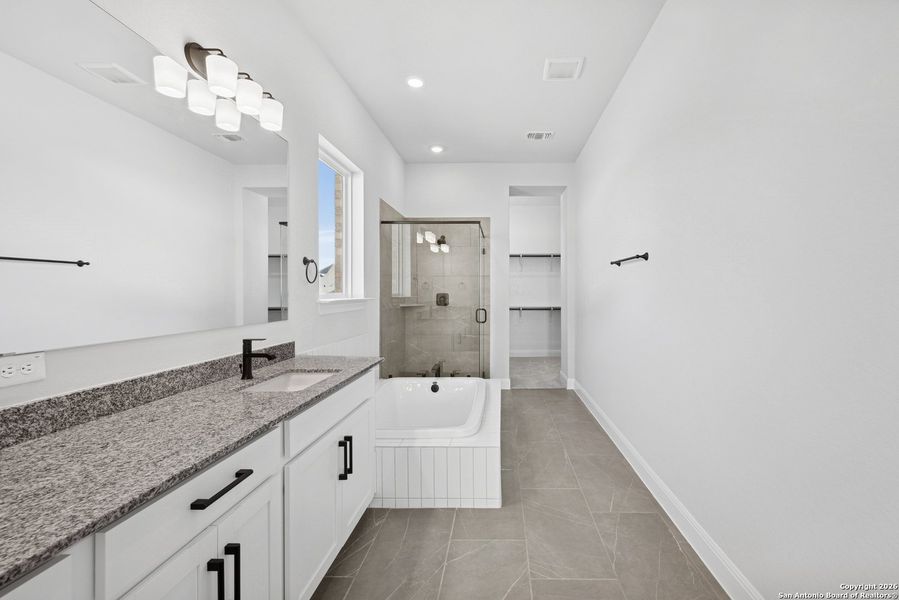 Furnished interior view inside a new home in Windsong - Legacy Series, Boerne (Image 7).