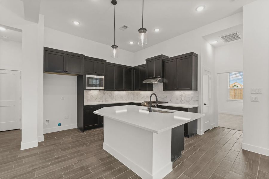Representative furnished interior of a home built from the Rowen by Chesmar Homes in Brookewater 45's, Rosenberg (Image 9).