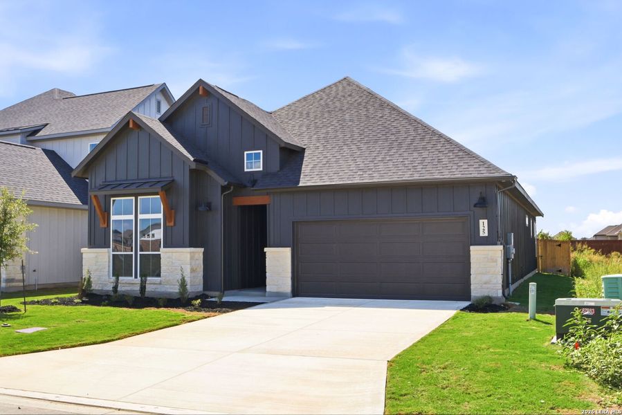 Front exterior of a new home in Megan's Landing, Castroville, TX, highlighting curb appeal (Image 2). Front exterior of a new home in Megan's Landing, Castroville, TX, highlighting curb appeal (Image 2).