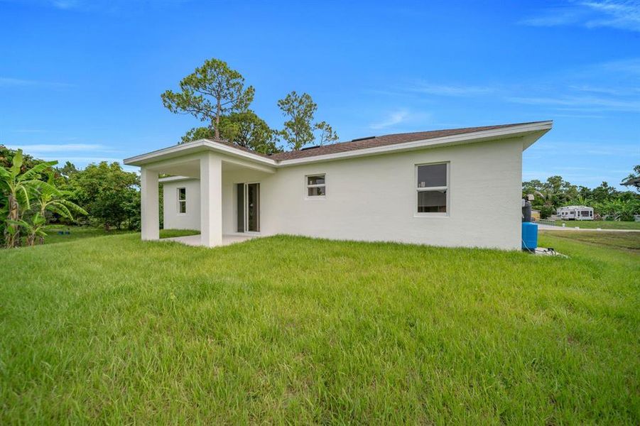 Exterior details and patio area of a home in , Lehigh Acres (Image 4).