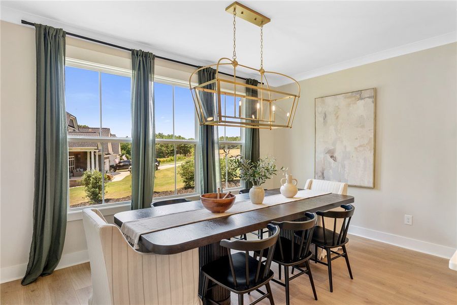 This bright dining area features ample natural lig