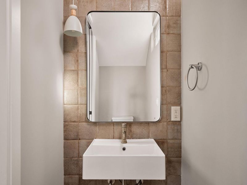 Half bath with tile walls