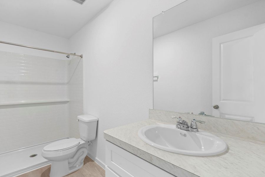 Furnished interior view inside a new home in The Courtyards at Stokesbury, Waller (Image 7).