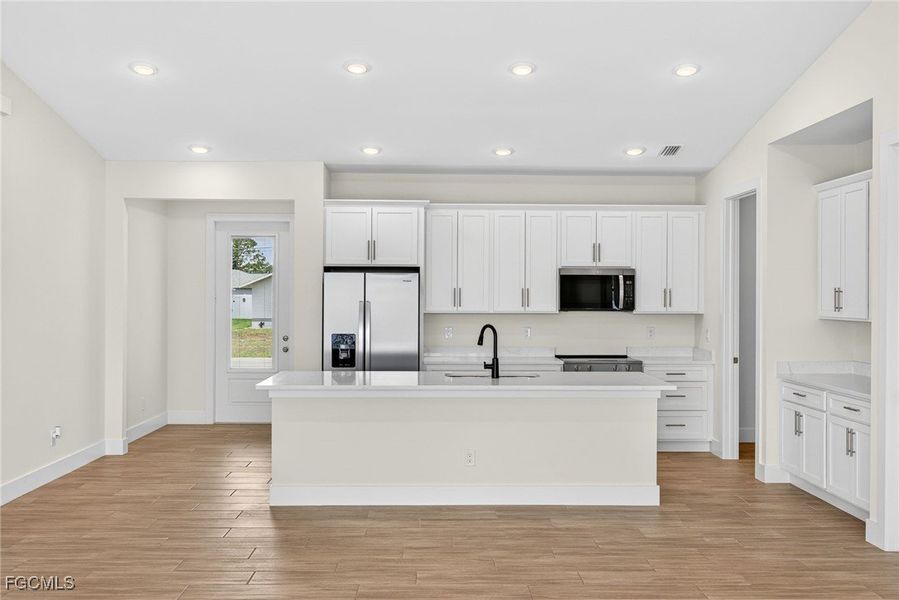 Furnished interior view inside a new home in Cape Coral, Cape Coral (Image 12). Furnished interior view inside a new home in Cape Coral, Cape Coral (Image 12).