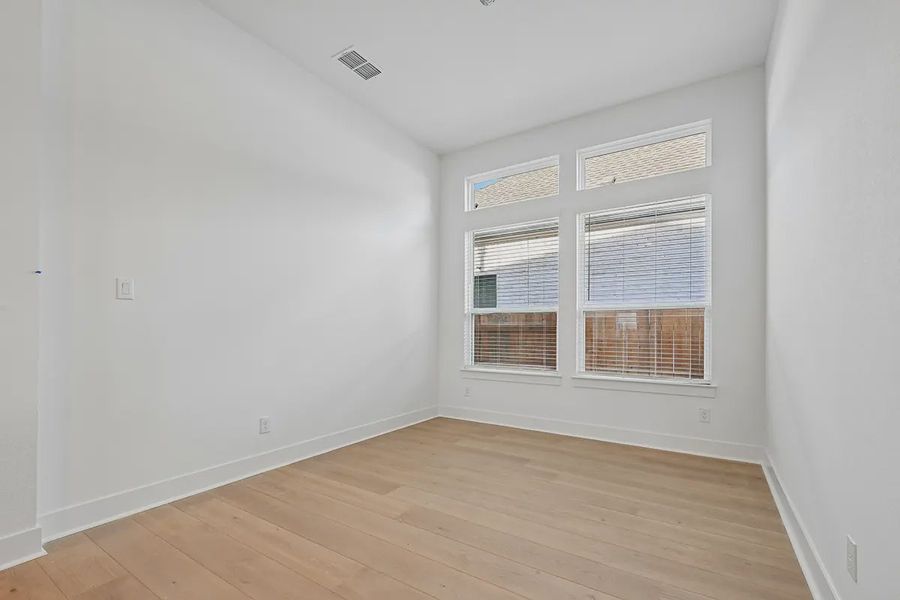 Representative unfurnished interior of a home built from the Raegan by Chesmar Homes in Sweetwater, Austin (Image 14). Representative unfurnished interior of a home built from the Raegan by Chesmar Homes in Sweetwater, Austin (Image 14).