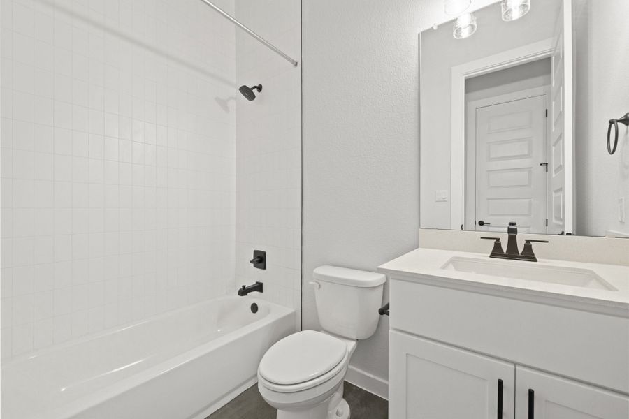Furnished interior view inside a new home in Heritage, Dripping Springs (Image 7).