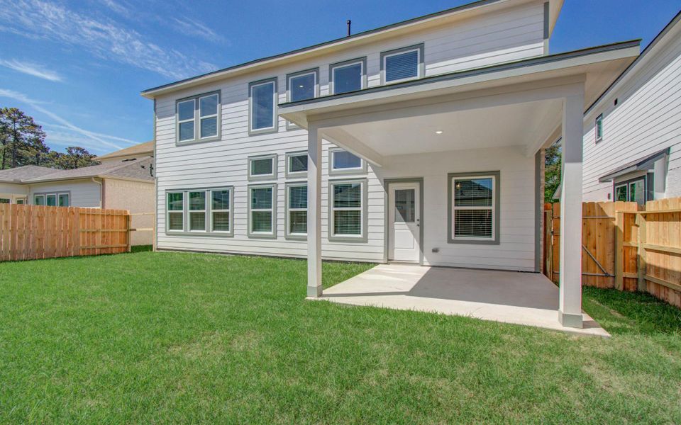 Exterior details and patio area of a home in Harmony Cove, Humble (Image 4).