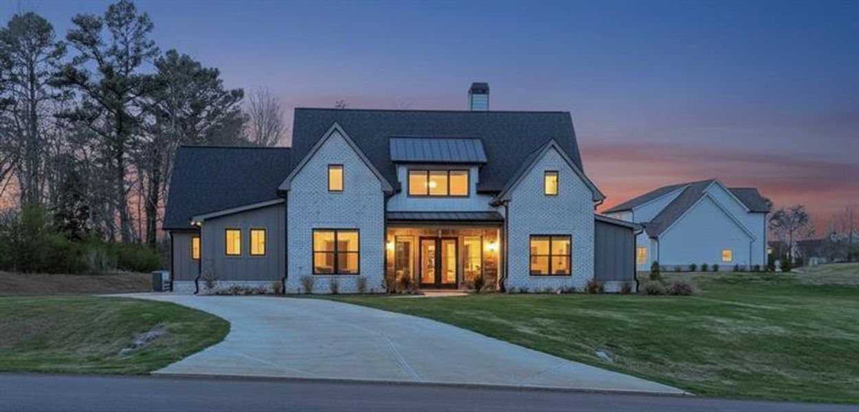 Front exterior of a new home in , Rydal, GA, highlighting curb appeal (Image 29). Front exterior of a new home in , Rydal, GA, highlighting curb appeal (Image 29).