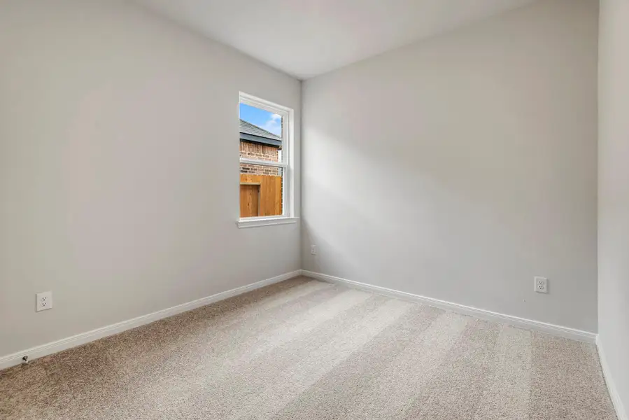 Spacious, unfurnished interior of a new home in Freeman Ranch, Katy (Image 9).