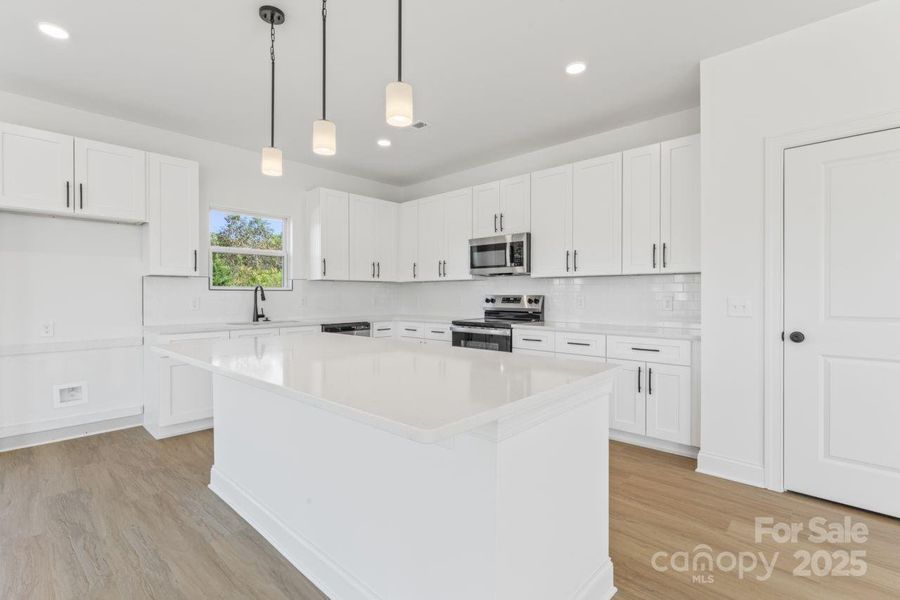 Furnished interior view inside a new home in , Statesville (Image 11).