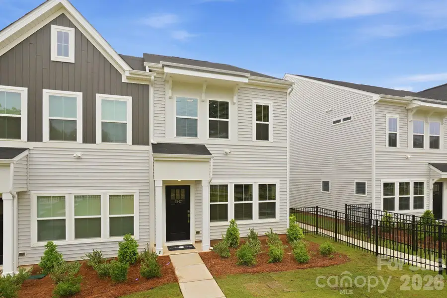 Front exterior of a new home in Sloan Station, Charlotte, NC, highlighting curb appeal (Image 17).